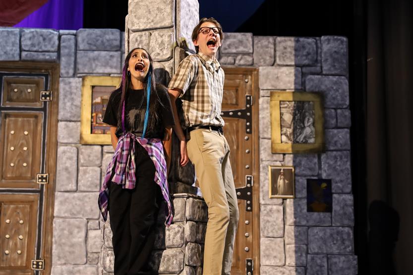 Students perform onstage